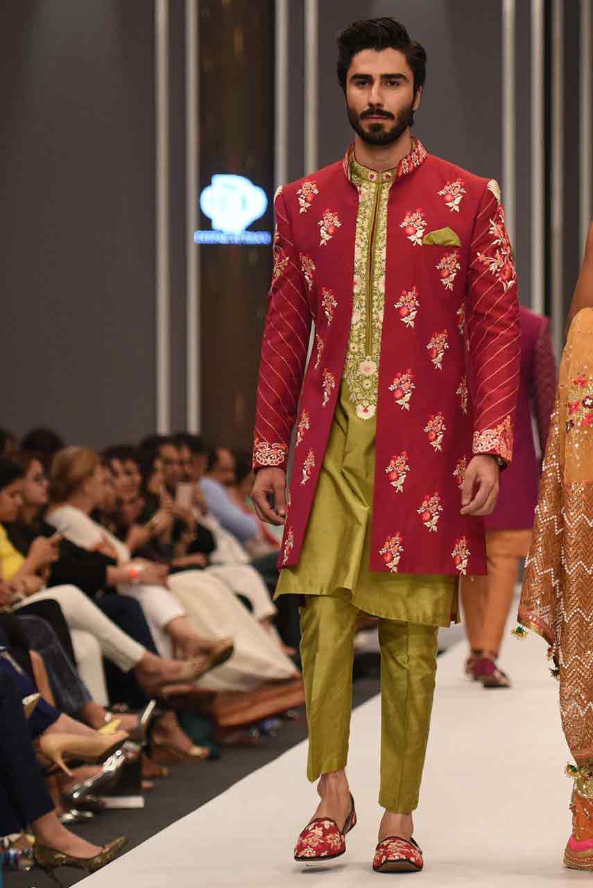 new trend of green pakistani groom wedding sherwani designs 2018 for mehndi with pink embroidered coat