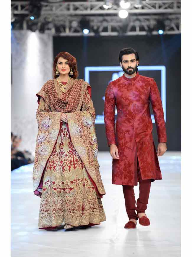 Bridal in red and maroon embroidered lehnga choli with dupatta and groom in matching maroon sherwani with pajama latest indian and pakistani wedding matching dress combinations for bride and groom 2017