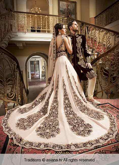 Bridal in long tail white embroidered lehnga choli and groom in matching sherwani latest indian and pakistani wedding matching dress combinations for bride and groom 2017