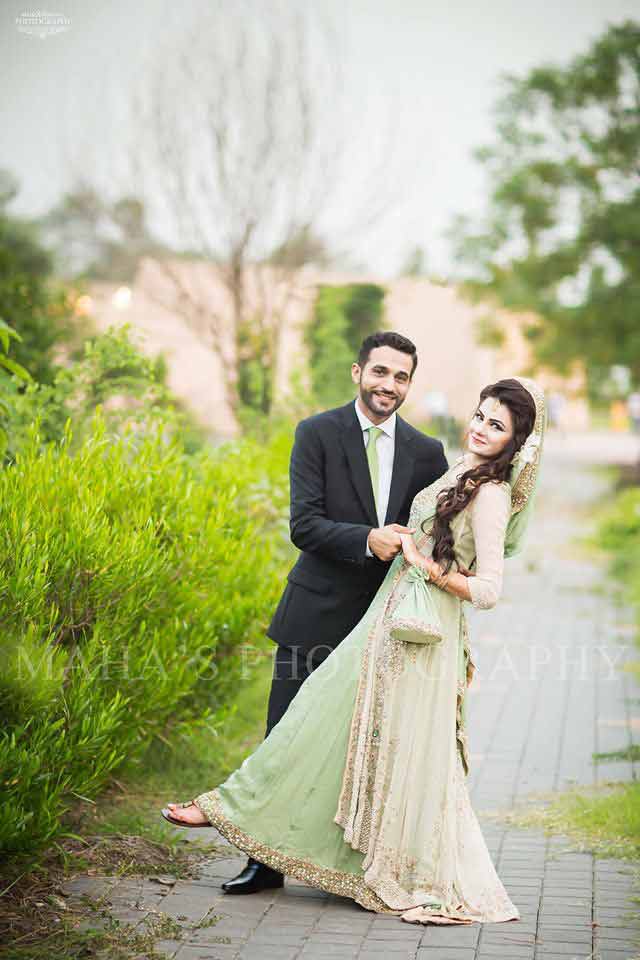 bride in light green bridal dress and dupatta and groom in pant coat with matching light green tie latest indian and pakistani wedding matching dress combinations for bride and groom 2017