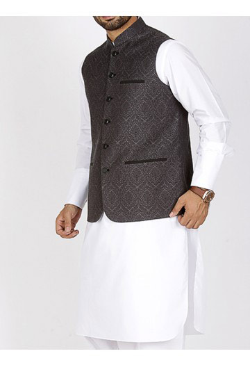 men black waistcoat with white kurta men eid kurta shalwar kameez and waistcoat dress designs 2017 by Junaid Jamshed 