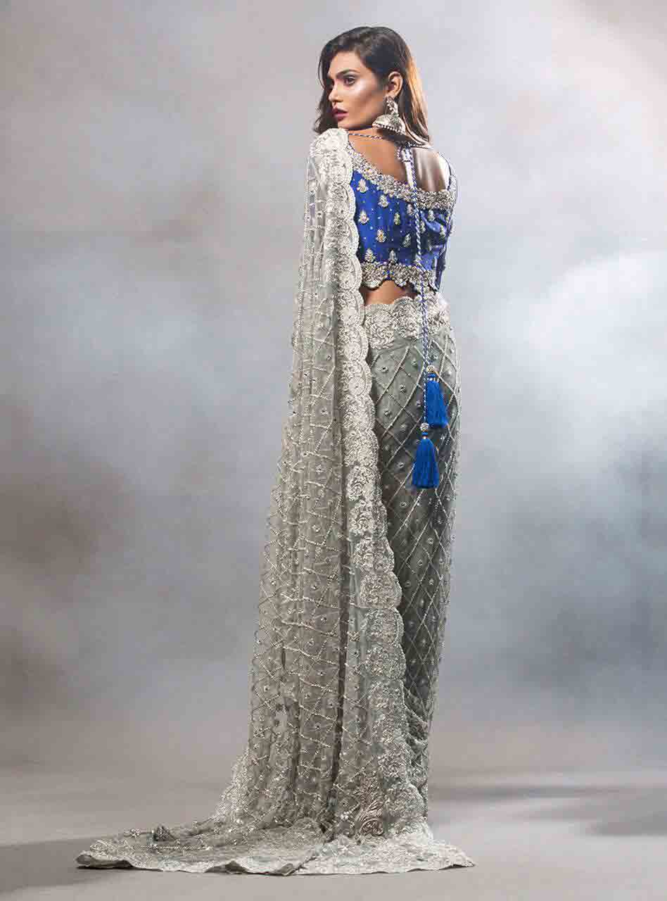 Pakistani saree designs in blue and grey colors for wedding brides