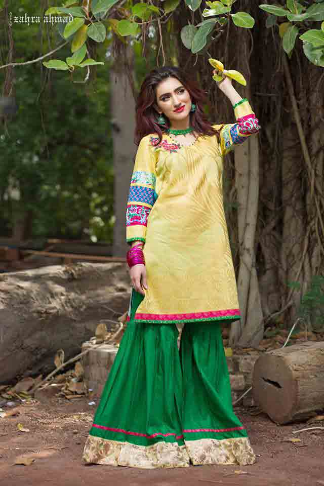 Latest yellow short shirt with green sharara or gharara by by Zahra Ahmad Eid dresses for girls in Pakistan