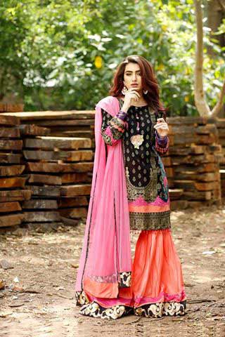 Black shirt with orange ghagra and pink dupatta by Zahra Ahmad Eid dresses for girls in Pakistan