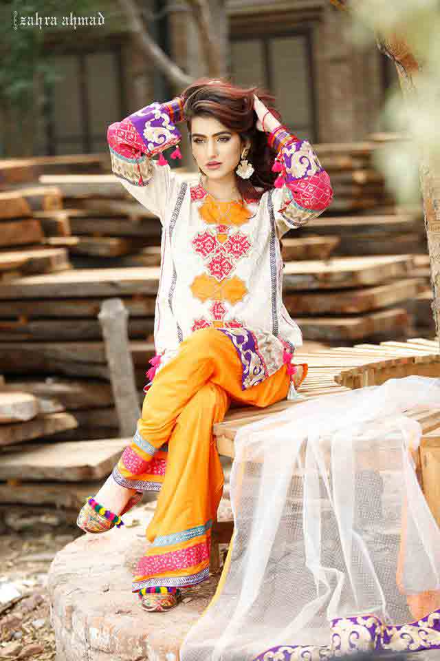 New white and yellow short shirt with matching pajama by Zahra Ahmad Eid dresses for girls in Pakistan