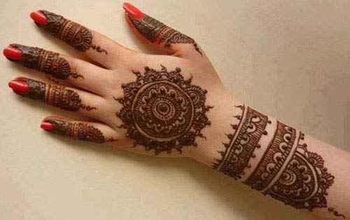 Floral simple gol tikka mehndi designs 2017 for back hands