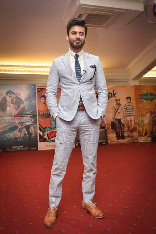 Fawad Khan in white shirt and blue tie combinations with light blue suits in Pakistan