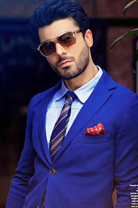 Fawad Khan in white shirt and blue tie combinations with navy blue suits in Pakistan