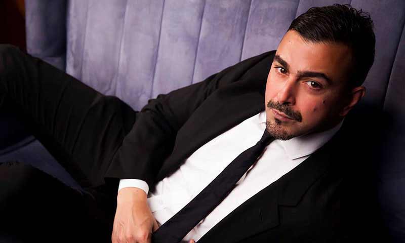 Shan in white shirt and black tie combinations with black suits in Pakistan