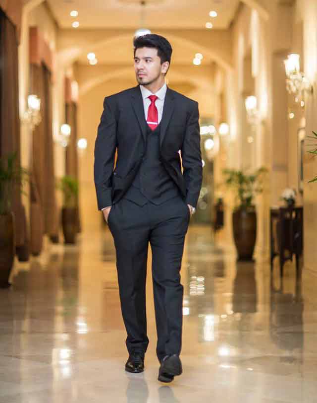 White shirt and red tie combinations with black suits in Pakistan