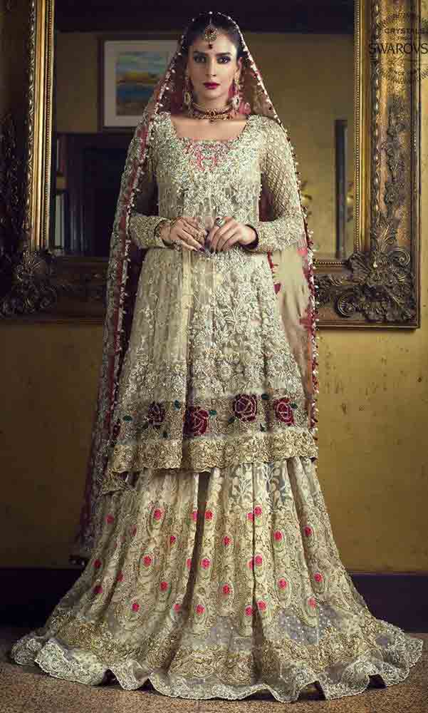 Latest design of peplum with lehenga style Pakistani bridal dress in red and golden color combinations 2018