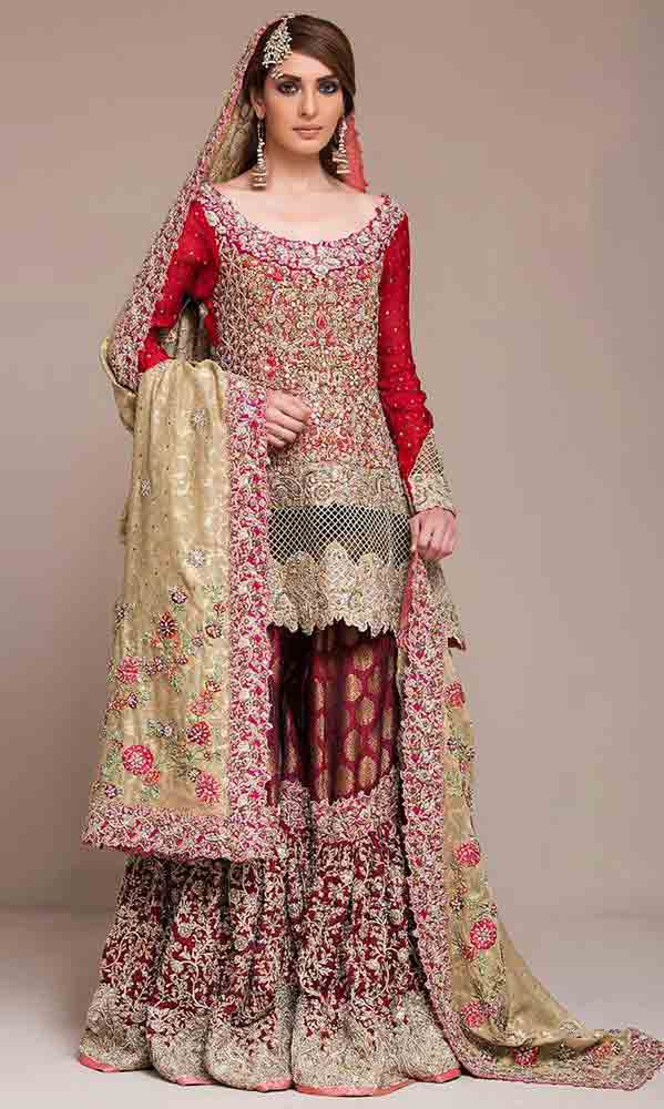 Trendy short shirt with gharara style Pakistani bridal dress in red and golden color combinations 2018