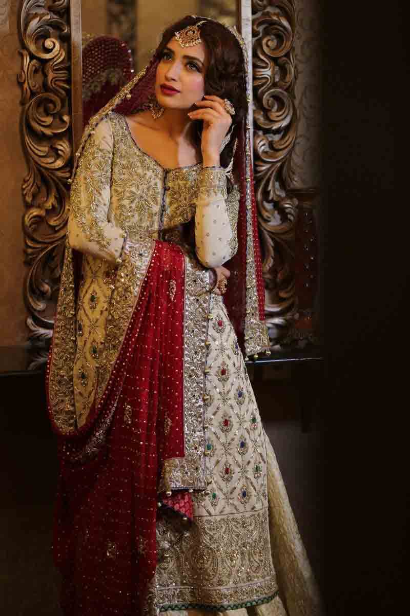 Beautiful Pakistani bridal dress in red and golden color combinations 2018