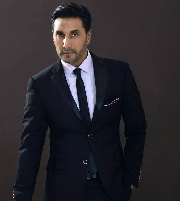 Pakistani Adnan Siddiqui in suit and necktie