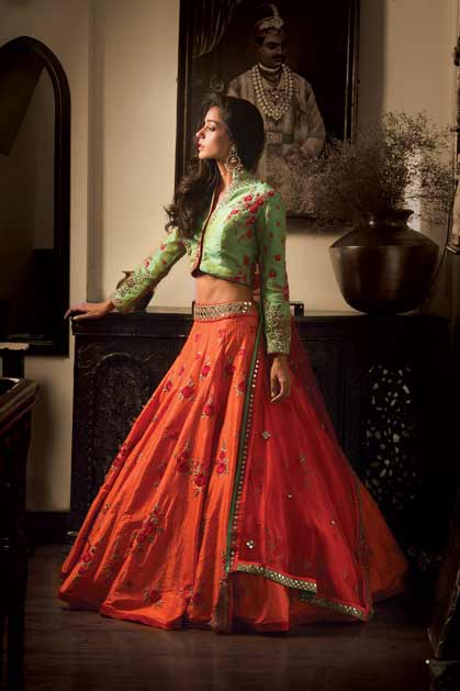 Pakistani green and orange lehenga choli for pear body