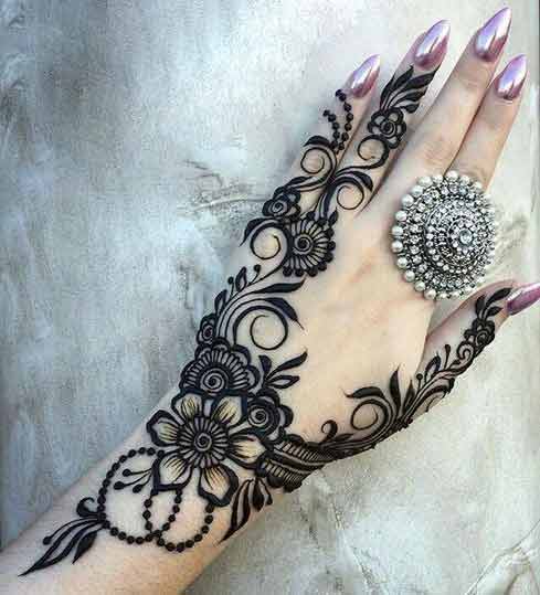 Latest thick Eid mehndi designs for back hand