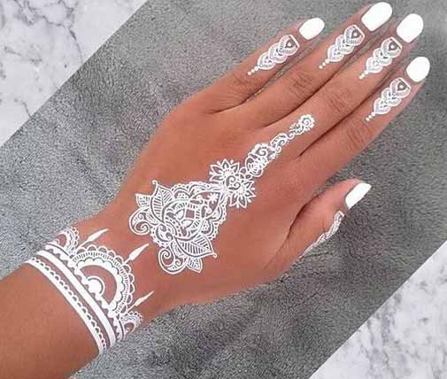 Thick white mehndi styles for back hands