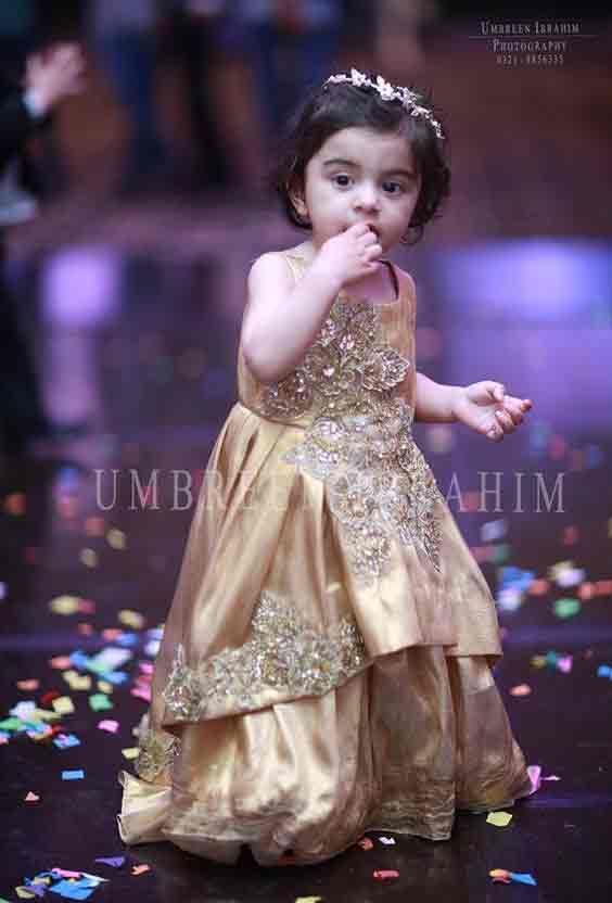 Golden baby girl princess wedding frock in Pakistan