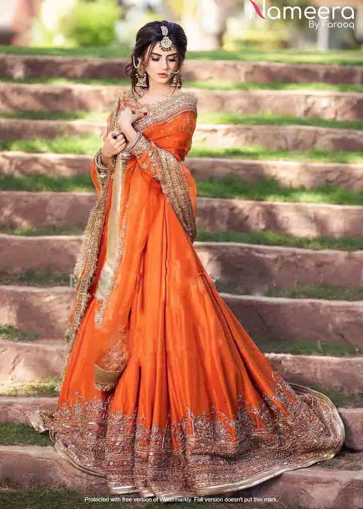 Orange flared long frock for wedding 